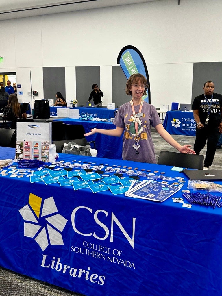 Librarian Stephanie tabling
