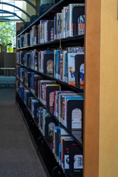 A photo of a bookshelf at the West Charleston campus
